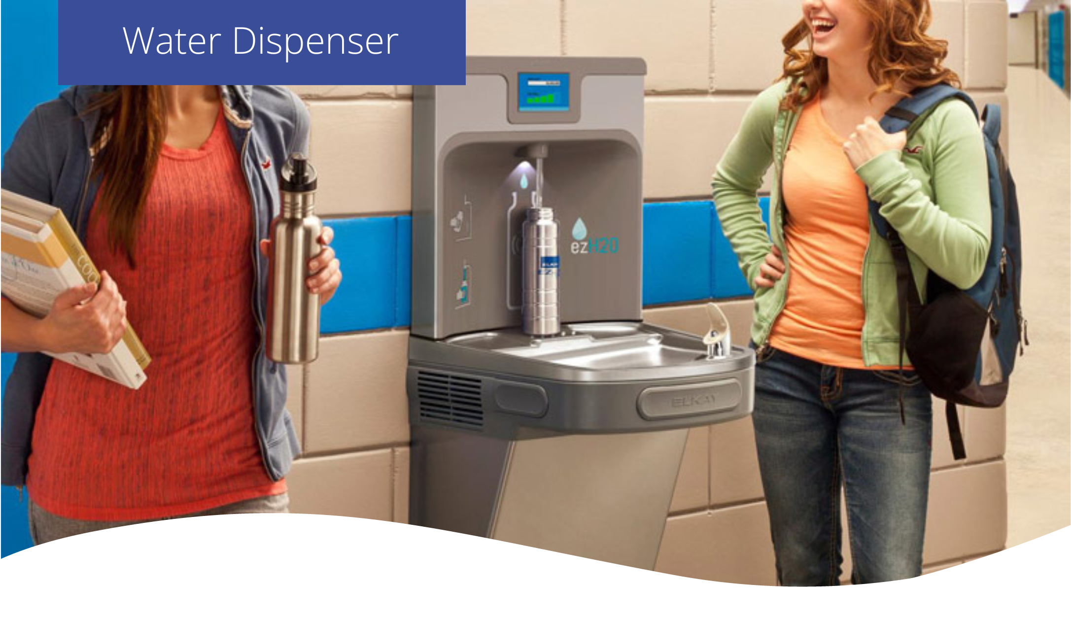 two student stood by an Elkay EZH2O water fountain