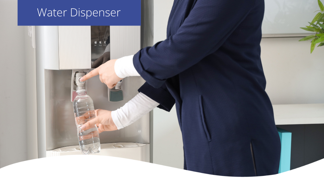An office worker using a water dispenser to fill their water bottle