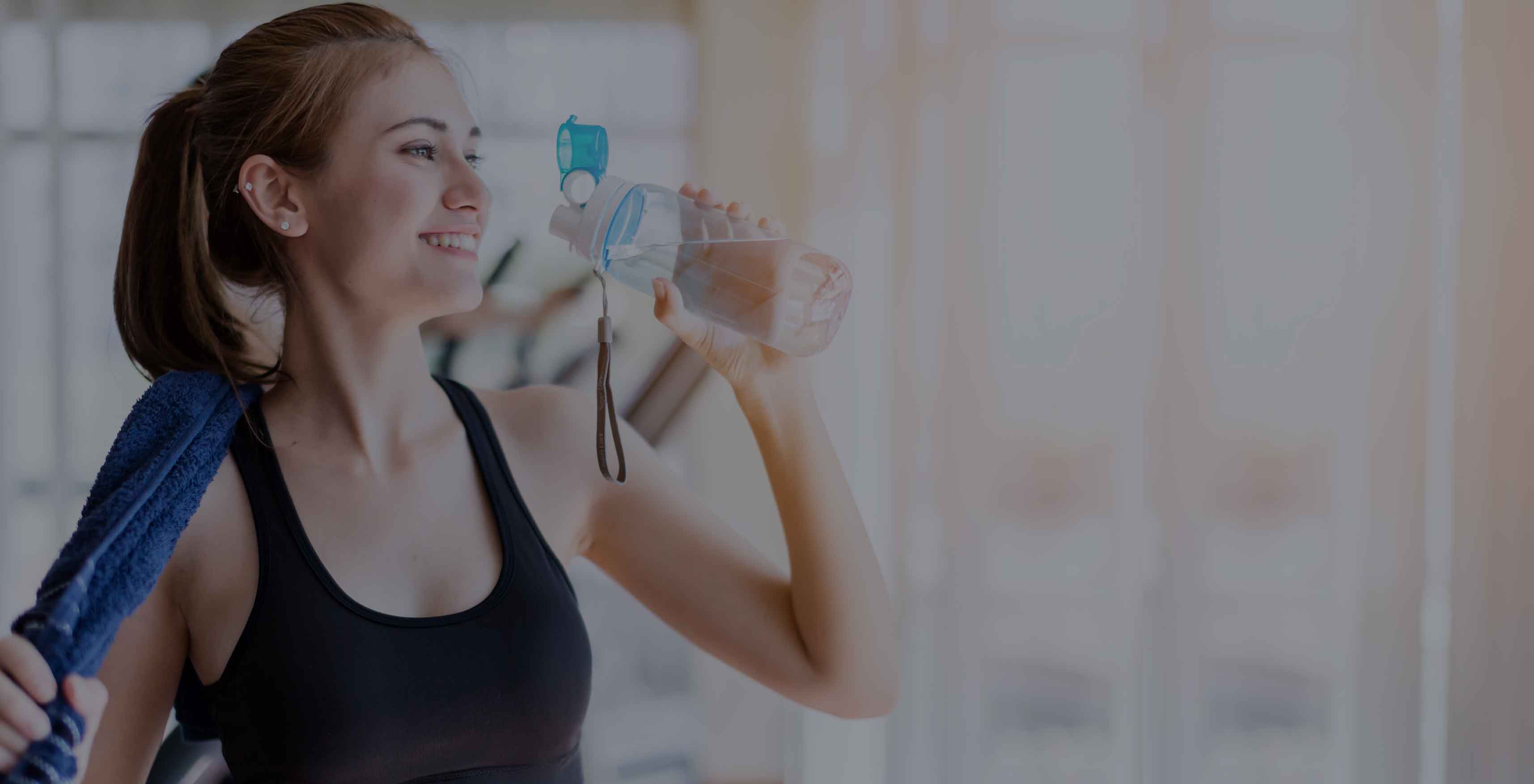 refillable drinking bottle for drinking water in the gym