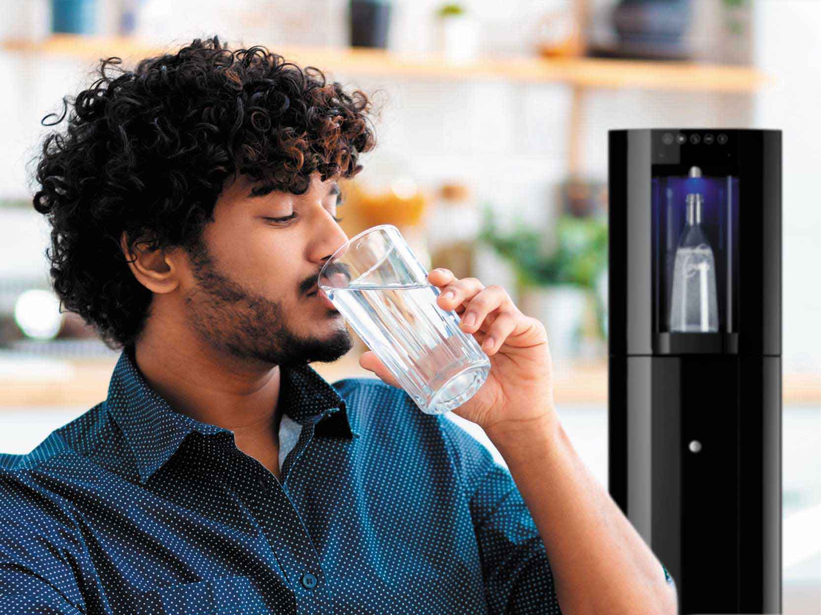 drinking water in glass from mains fed water coolers london