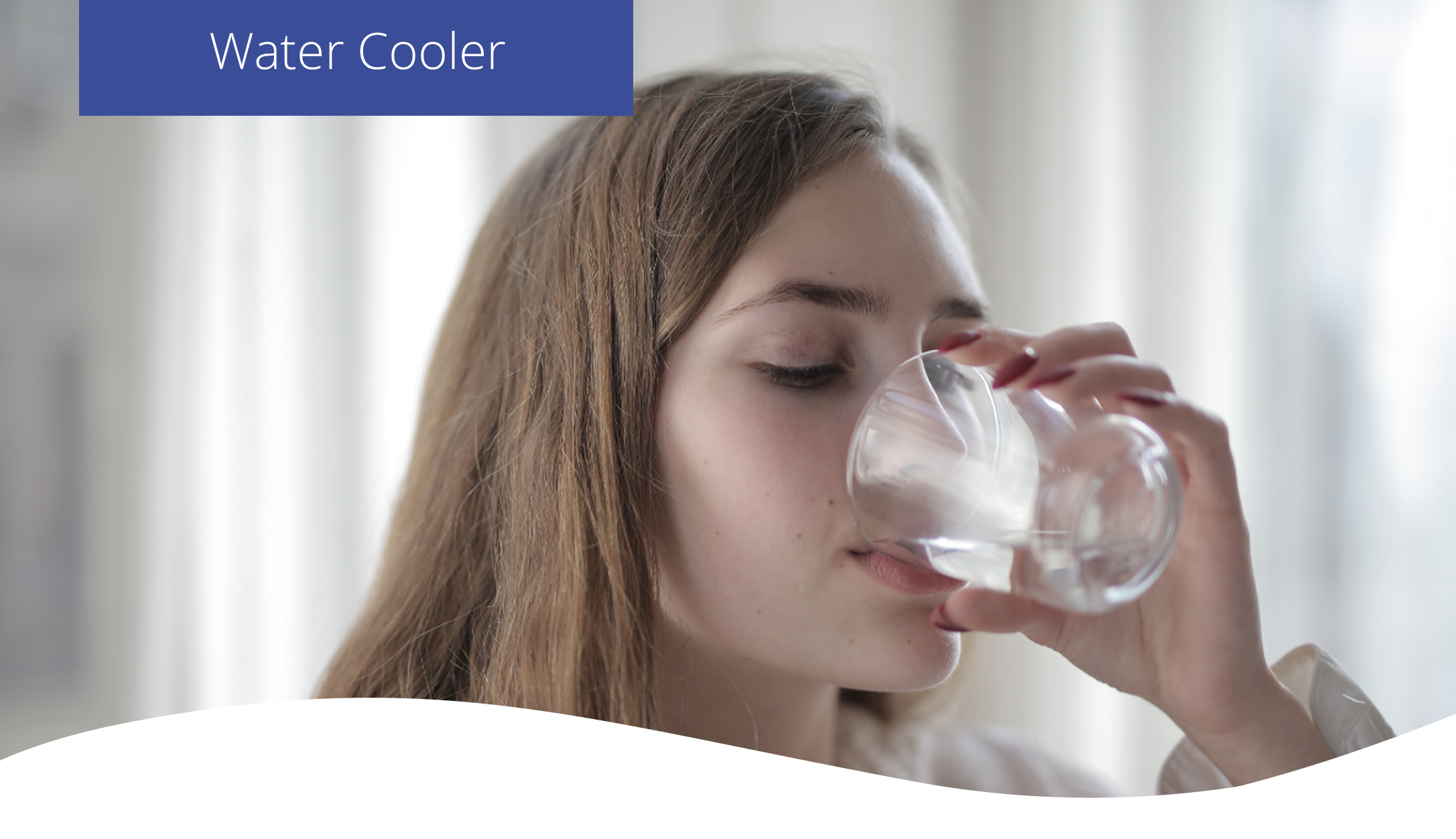 Woman drinking fresh spring water from a water cooler